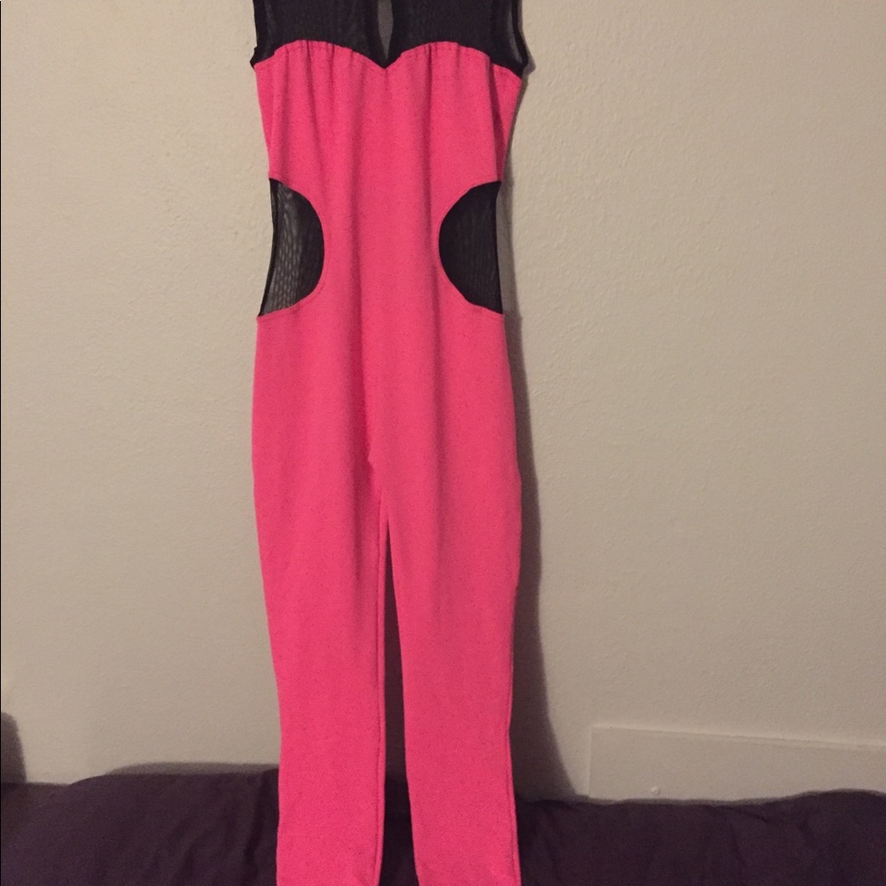 Hot pink cut out bodysuit.